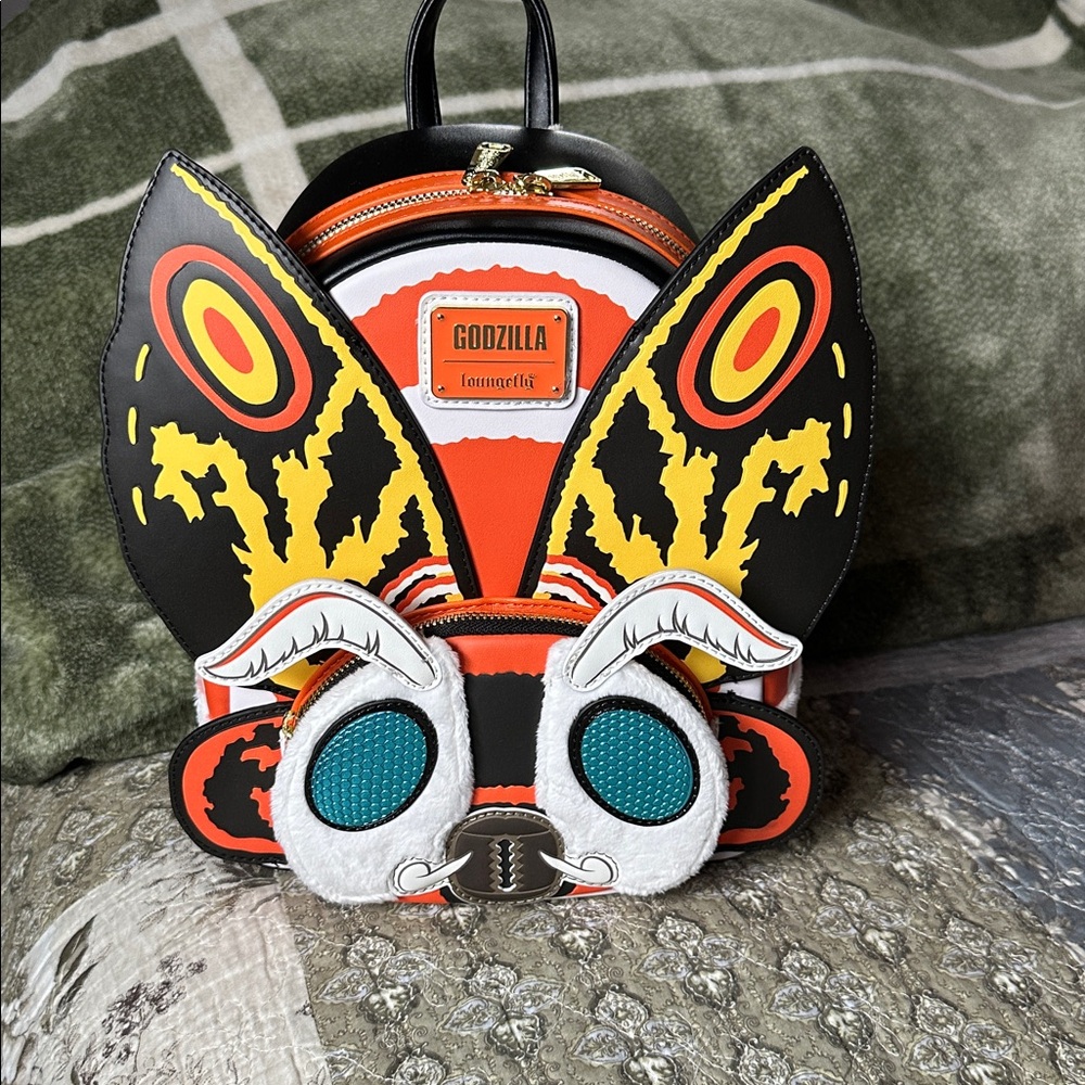 Beautiful Loungefly featuring Mothra,  new with tags